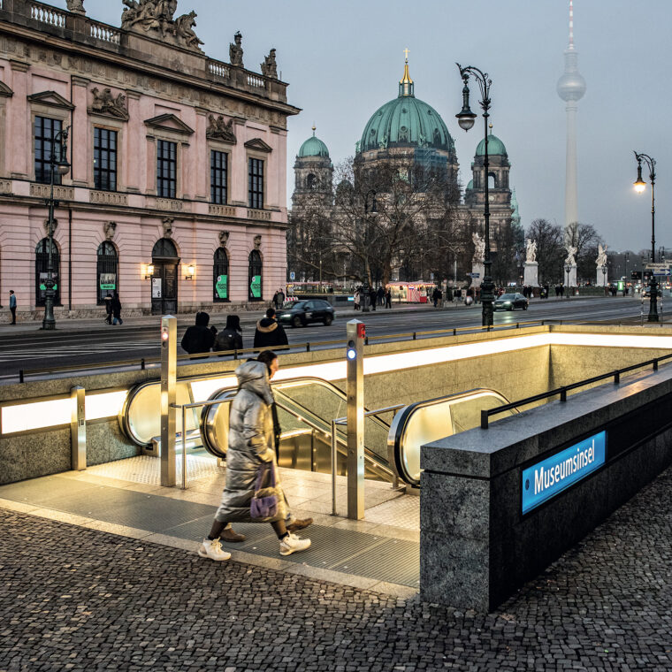 light subway entrance by night. no text.